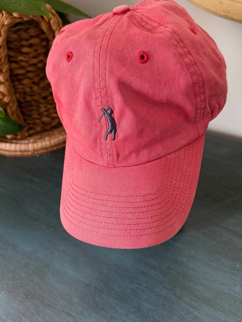 Bobby Jones Golfer mid swing logo Red hat. Snap back adjustable.